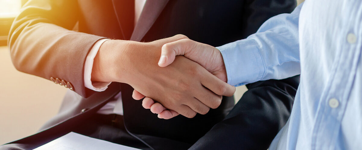 Partnership. two business man investor handshake deal with partner after finishing up business meeting in meeting room office, partner, financial, teamwork, job interview, contract agreement concept